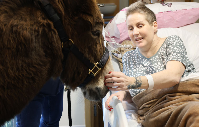 Image: Victoria with a donkey at the hospice