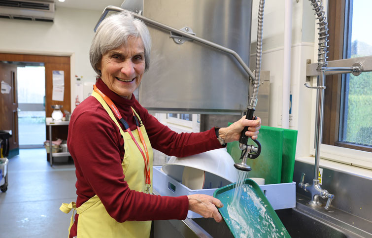 Image: Lotte Sherman volunteering in the St Helena Hospice kitchen